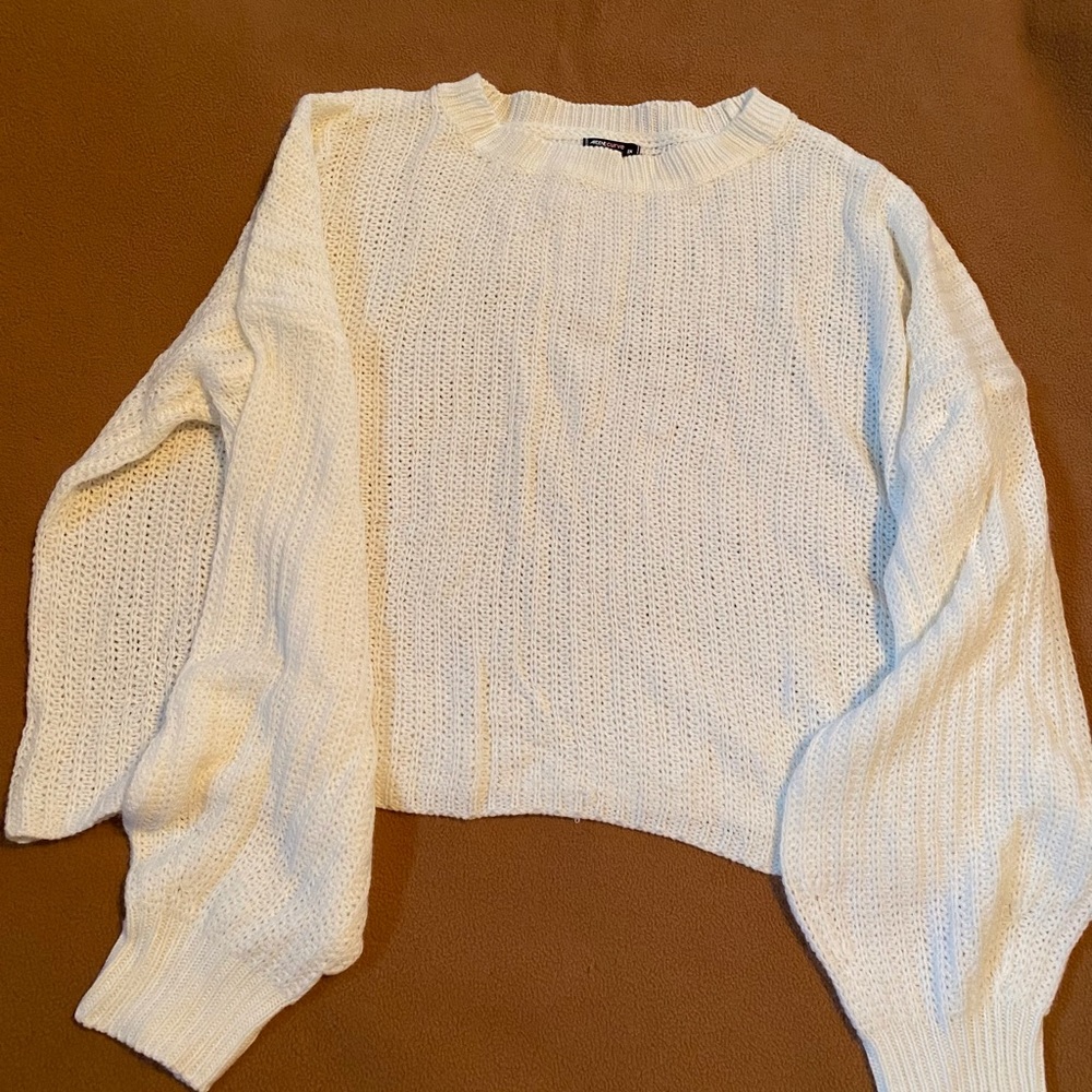 White knitted sweater